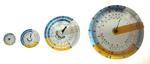 Four Controller slide rules