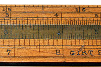 Close-up of logarithmic scales on Coggeshall rule