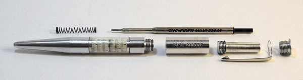 The dismantled components of the Pose-Marre slide rule pen