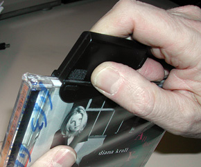 EZ-CD disc case opener in use
