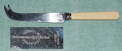 Stainless cheese knife