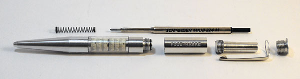 The dismantled components of the Pose-Marre slide rule pen