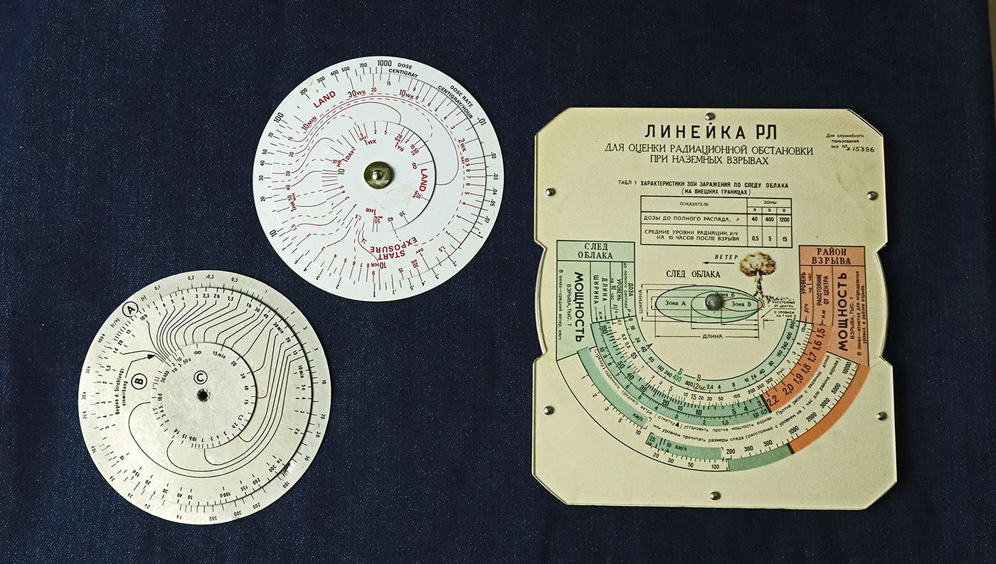 Three radiation slide rules