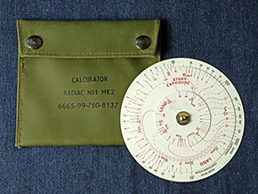 Radiac radiation slide rule with case