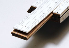 Tavernier-Gravet slide rule with peeled celluloid facing