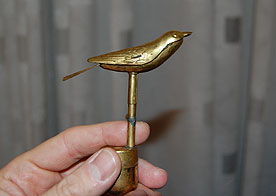 The "brass canary" toy