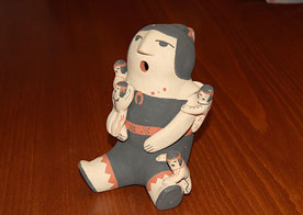 A Jemez storyteller doll